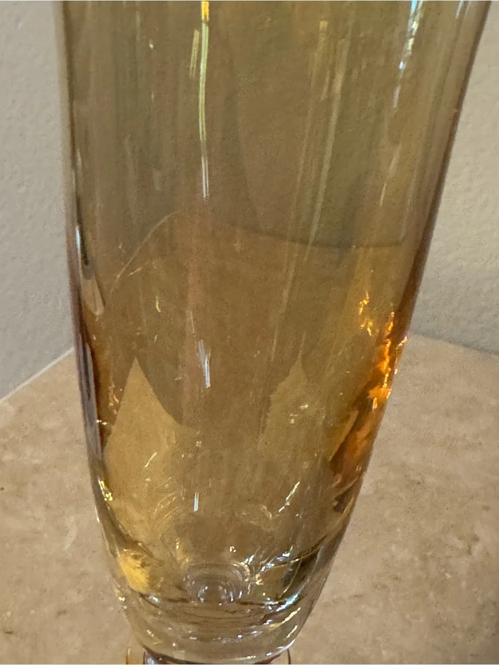Pair of Vintage Iridescent Amber Fluted Champagne Glasses with Clear Stem.
